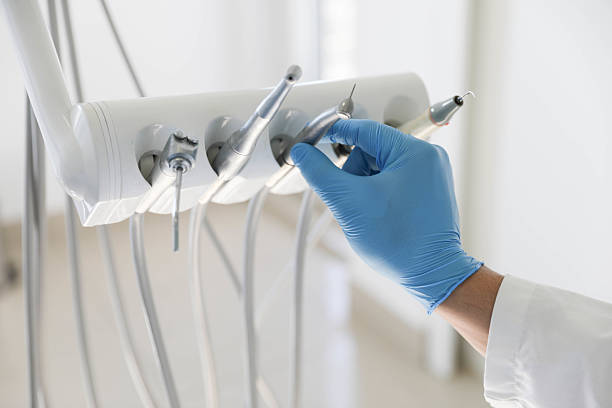 Professional Emergency Dentist technician working in Random Lake, WI